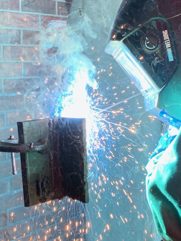 Seeds to Skills apprentice working on a welding project